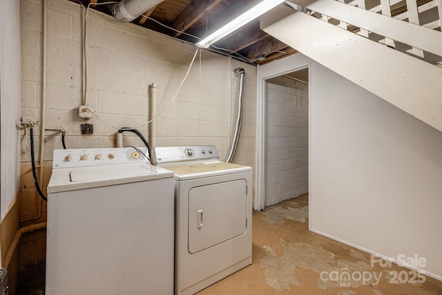 washroom featuring washer and dryer