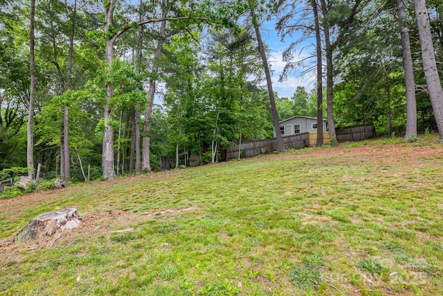 view of yard with fence