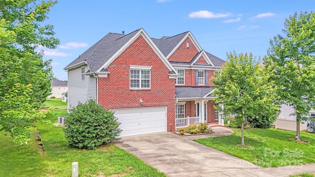 6227 Castlecove Rd, Charlotte, NC 28278 - traditional home featuring brick siding, a front lawn, an attached garage, and driveway