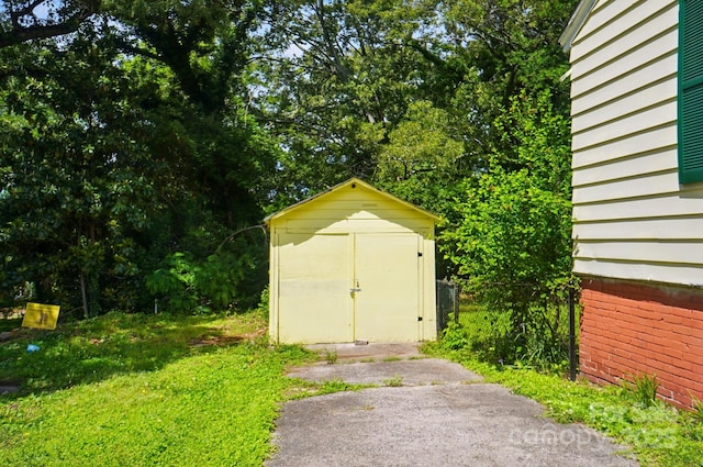 garage featuring a storage unit