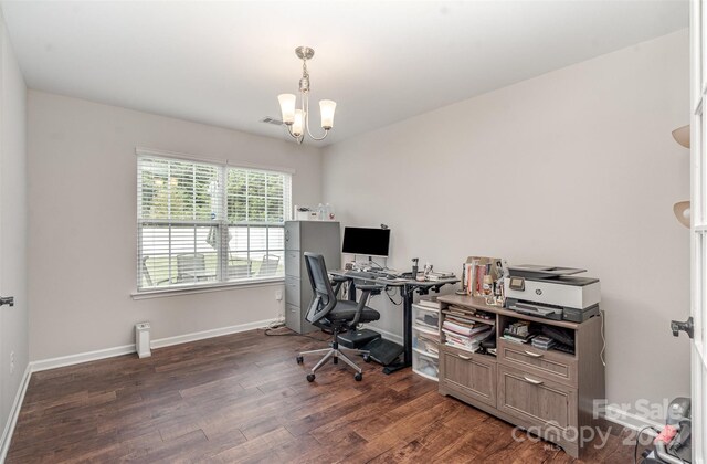 home office with a chandelier, dark wood-style flooring, and baseboards