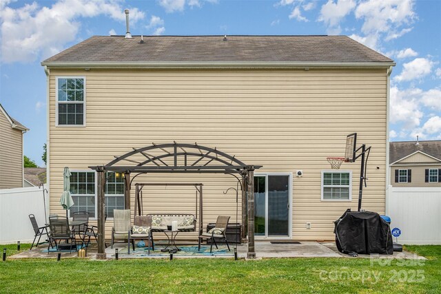 back of house with an outdoor living space, a pergola, a patio, and roof with shingles
