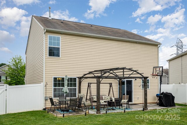 back of property with a pergola, a patio, an outdoor hangout area, and a gate