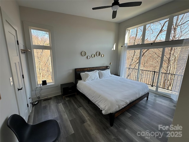3149 Winter Hawk Ln, Lenoir, NC 28645 - bedroom with wood finished floors, access to exterior, baseboards, and ceiling fan