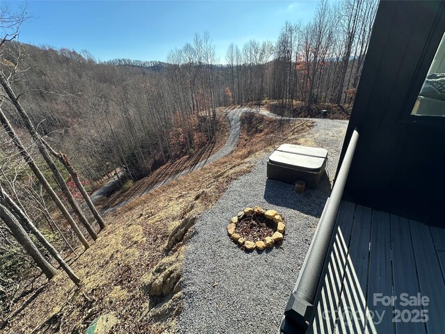 3149 Winter Hawk Ln, Lenoir, NC 28645 - view of yard with a forest view