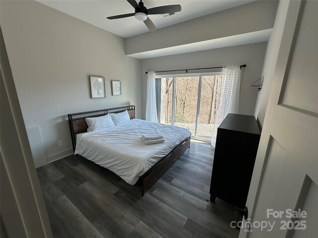 3149 Winter Hawk Ln, Lenoir, NC 28645 - bedroom featuring access to exterior, dark wood-style flooring, baseboards, and ceiling fan