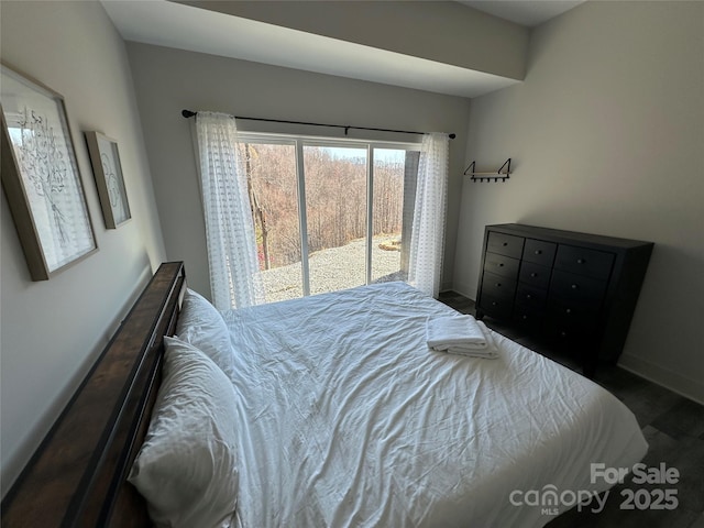 3149 Winter Hawk Ln, Lenoir, NC 28645 - bedroom with wood finished floors and baseboards