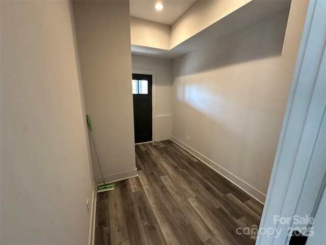 3149 Winter Hawk Ln, Lenoir, NC 28645 - corridor with dark wood-type flooring, baseboards, a tray ceiling, and recessed lighting