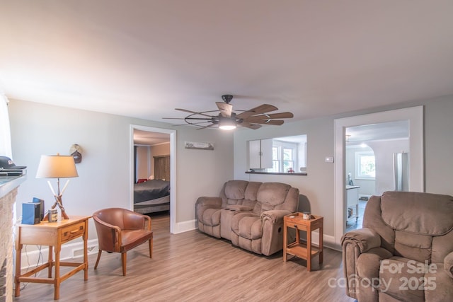 28782 Canton Rd Unit A, Albemarle, NC 28001 - living room featuring light wood-style floors, ceiling fan, and baseboards