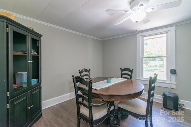 28782 Canton Rd Unit A, Albemarle, NC 28001 - dining area with dark wood-type flooring, baseboards, a ceiling fan, and ornamental molding