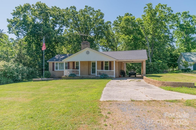 28782 Canton Rd Unit A, Albemarle, NC 28001 - ranch-style home featuring a porch, concrete driveway, a chimney, a front lawn, and a carport