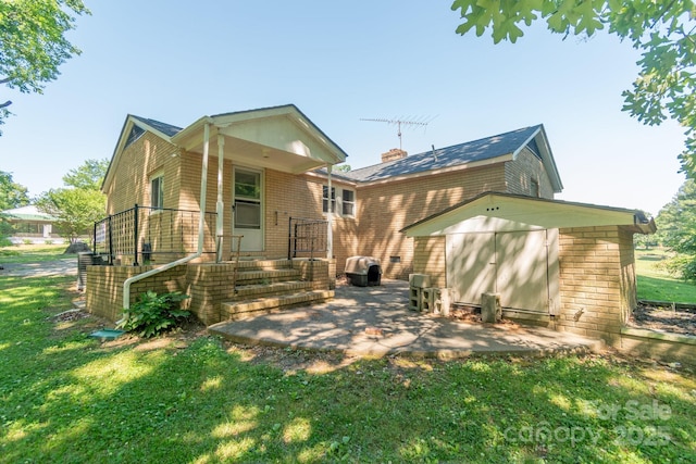 28782 Canton Rd Unit A, Albemarle, NC 28001 - back of property featuring brick siding, a lawn, and a patio