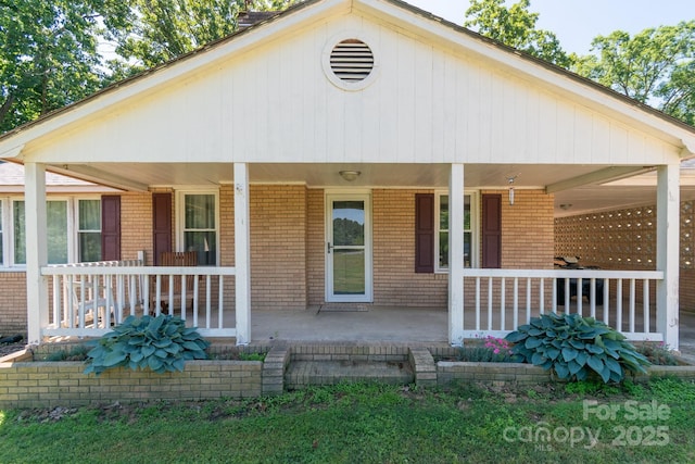 28782 Canton Rd Unit A, Albemarle, NC 28001 - bungalow-style home featuring a porch and brick siding