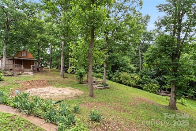 603 Sunnybrook Dr, Monroe, NC 28110 - view of grassy yard with a porch