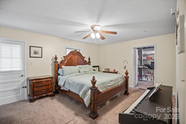 603 Sunnybrook Dr, Monroe, NC 28110 - bedroom with light colored carpet, a textured ceiling, and ceiling fan