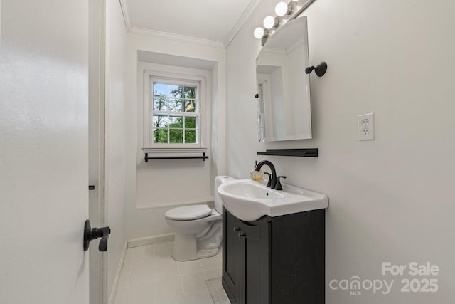 1014 Vandalia Dr, Charlotte, NC 28212 - bathroom featuring baseboards, vanity, ornamental molding, toilet, and tile patterned flooring