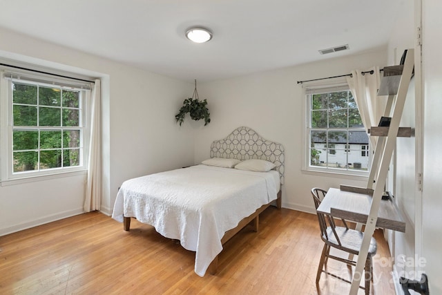 1014 Vandalia Dr, Charlotte, NC 28212 - bedroom with light wood-style flooring and baseboards