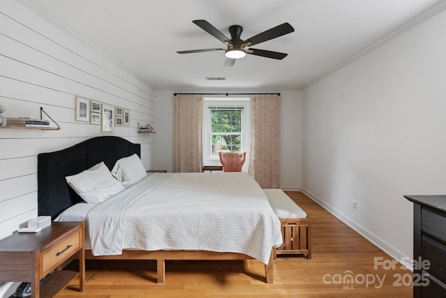 1014 Vandalia Dr, Charlotte, NC 28212 - bedroom with crown molding, wood finished floors, baseboards, and a ceiling fan