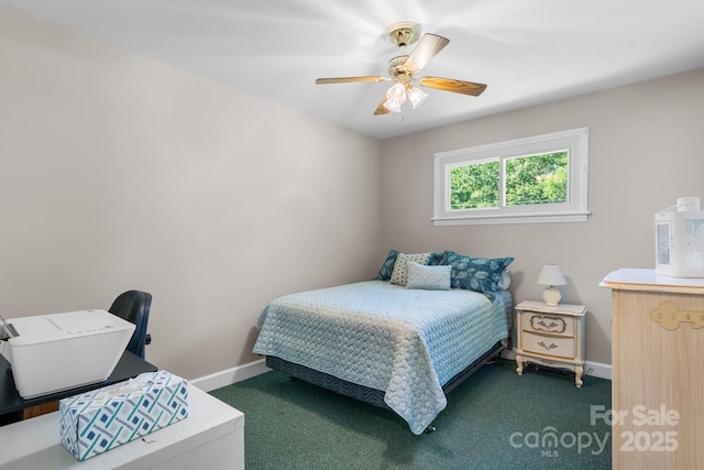 carpeted bedroom with baseboards and a ceiling fan
