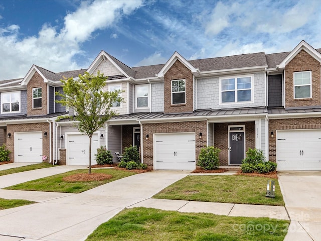 2141 Bexar Trl, Matthews, NC 28105 - view of property featuring a standing seam roof, brick siding, and a front yard