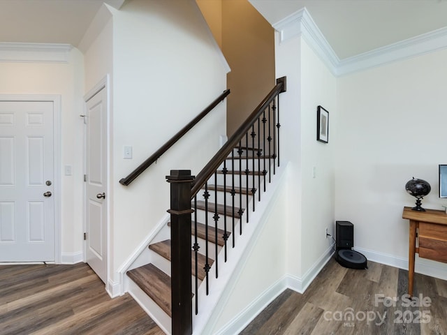 2141 Bexar Trl, Matthews, NC 28105 - staircase with wood finished floors, crown molding, and baseboards
