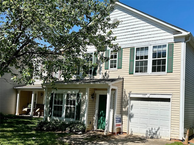 7307 Mitzi Deborah Ln, Charlotte, NC 28269 - view of front of property with an attached garage and concrete driveway