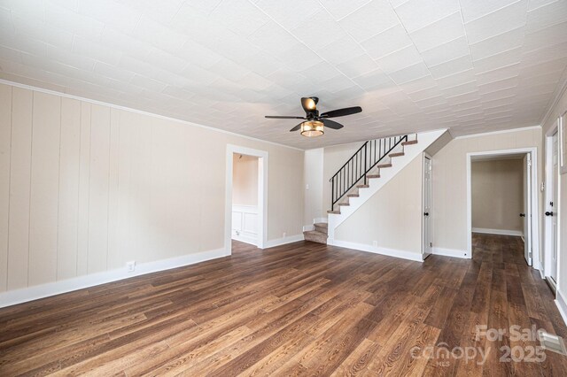 210 W 15th St, Newton, NC 28658 - unfurnished living room featuring dark wood finished floors, stairway, crown molding, ceiling fan, and baseboards