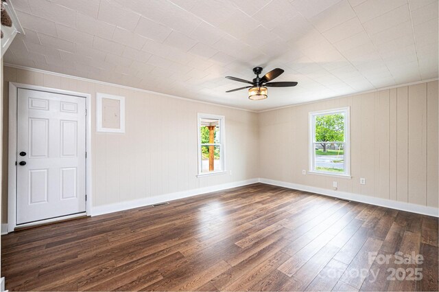 210 W 15th St, Newton, NC 28658 - unfurnished room featuring dark wood finished floors, crown molding, baseboards, and a ceiling fan