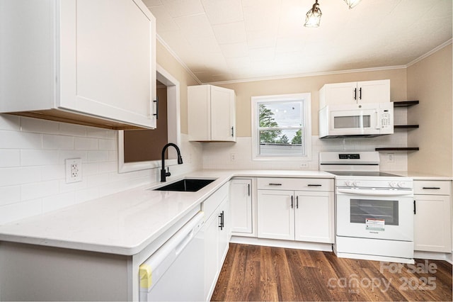 210 W 15th St, Newton, NC 28658 - kitchen featuring white appliances, a sink, ornamental molding, dark wood-type flooring, and white cabinetry