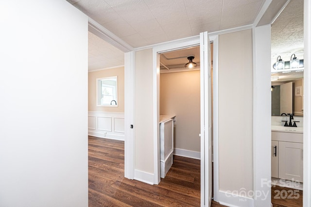 210 W 15th St, Newton, NC 28658 - hall featuring ornamental molding, a sink, and dark wood-style floors