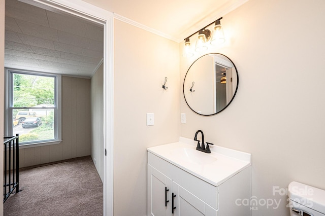 210 W 15th St, Newton, NC 28658 - bathroom with vanity, ornamental molding, and toilet