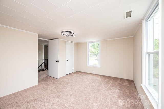 210 W 15th St, Newton, NC 28658 - carpeted empty room featuring crown molding