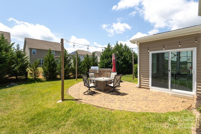 view of grassy yard featuring a patio