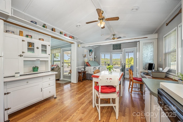 125 Maple St, New London, NC 28127 - dining area with light wood-type flooring, ceiling fan, and healthy amount of natural light