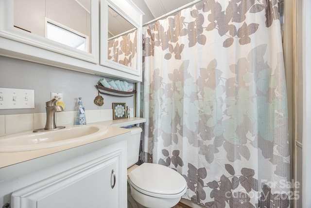 125 Maple St, New London, NC 28127 - bathroom with vanity, toilet, and a shower with curtain