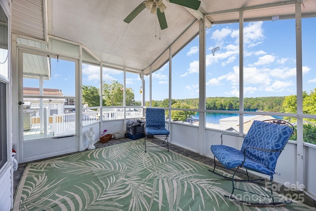 125 Maple St, New London, NC 28127 - sunroom / solarium featuring a ceiling fan, healthy amount of natural light, vaulted ceiling, and a water view