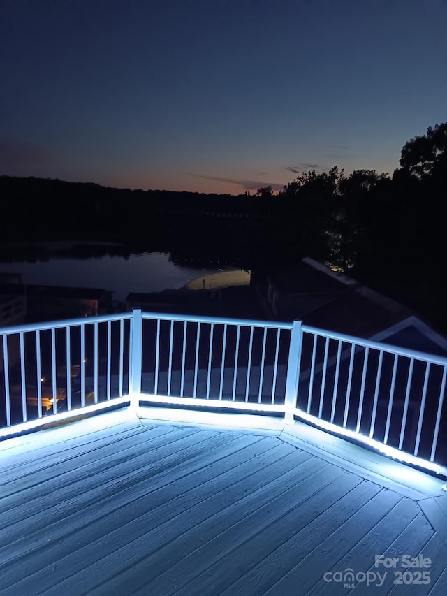 125 Maple St, New London, NC 28127 - view of deck at dusk