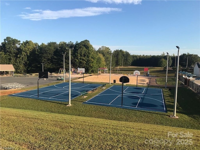 125 Maple St, New London, NC 28127 - view of basketball court featuring community basketball court and a lawn