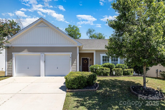 12792 Clydesdale Dr, Midland, NC 28107 - ranch-style house featuring an attached garage, driveway, a front lawn, board and batten siding, and roof with shingles