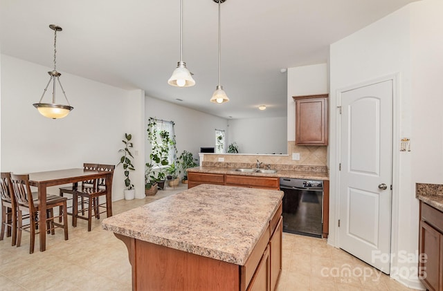 12792 Clydesdale Dr, Midland, NC 28107 - kitchen with dishwasher, a sink, a kitchen island, light countertops, and brown cabinets