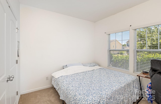 12792 Clydesdale Dr, Midland, NC 28107 - carpeted bedroom featuring baseboards