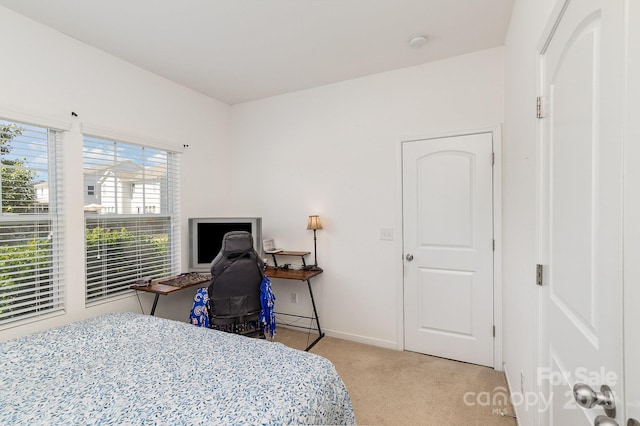 12792 Clydesdale Dr, Midland, NC 28107 - bedroom with light carpet, a desk, and baseboards