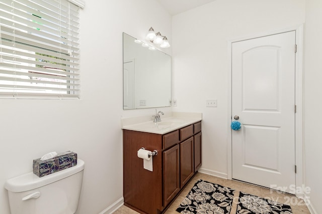 12792 Clydesdale Dr, Midland, NC 28107 - bathroom with vanity, baseboards, toilet, and tile patterned floors