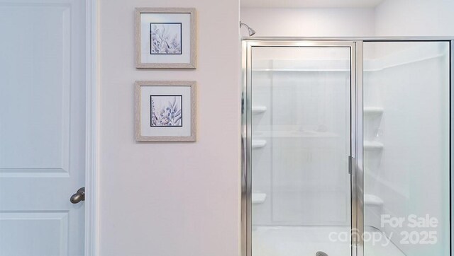 bathroom featuring a stall shower