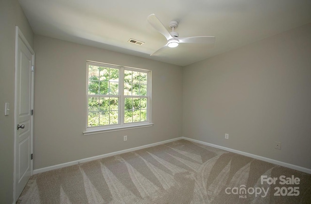 4938 Sunset Ridge Ct, Charlotte, NC 28269 - unfurnished room featuring baseboards, carpet flooring, and a ceiling fan