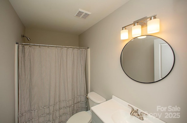 4938 Sunset Ridge Ct, Charlotte, NC 28269 - bathroom featuring vanity, toilet, and a shower with curtain