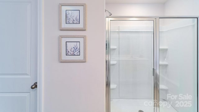 bathroom featuring a stall shower