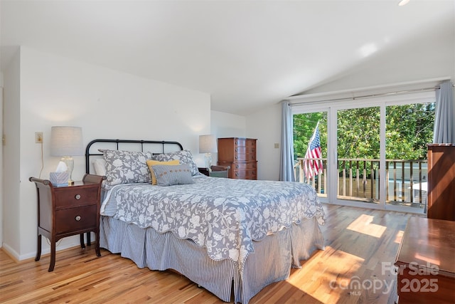 6664 Lake Shore Dr, Hickory, NC 28601 - bedroom featuring lofted ceiling, access to outside, wood finished floors, and baseboards