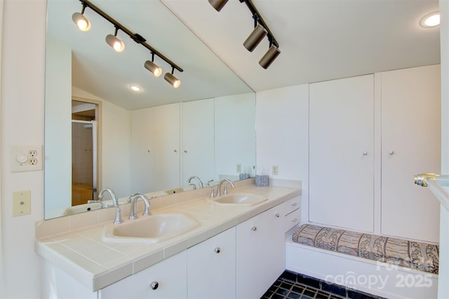 6664 Lake Shore Dr, Hickory, NC 28601 - full bath with double vanity, a shower, and track lighting