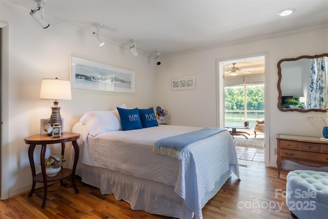 6664 Lake Shore Dr, Hickory, NC 28601 - bedroom featuring ornamental molding, access to exterior, and wood finished floors